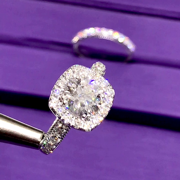 18kt White Gold Engagement Ring with 1.5 carat lab diamond at the center (Color: E | Clarity: VS1 | Round Cut) and natural E / VVS grade Setting Diamonds.